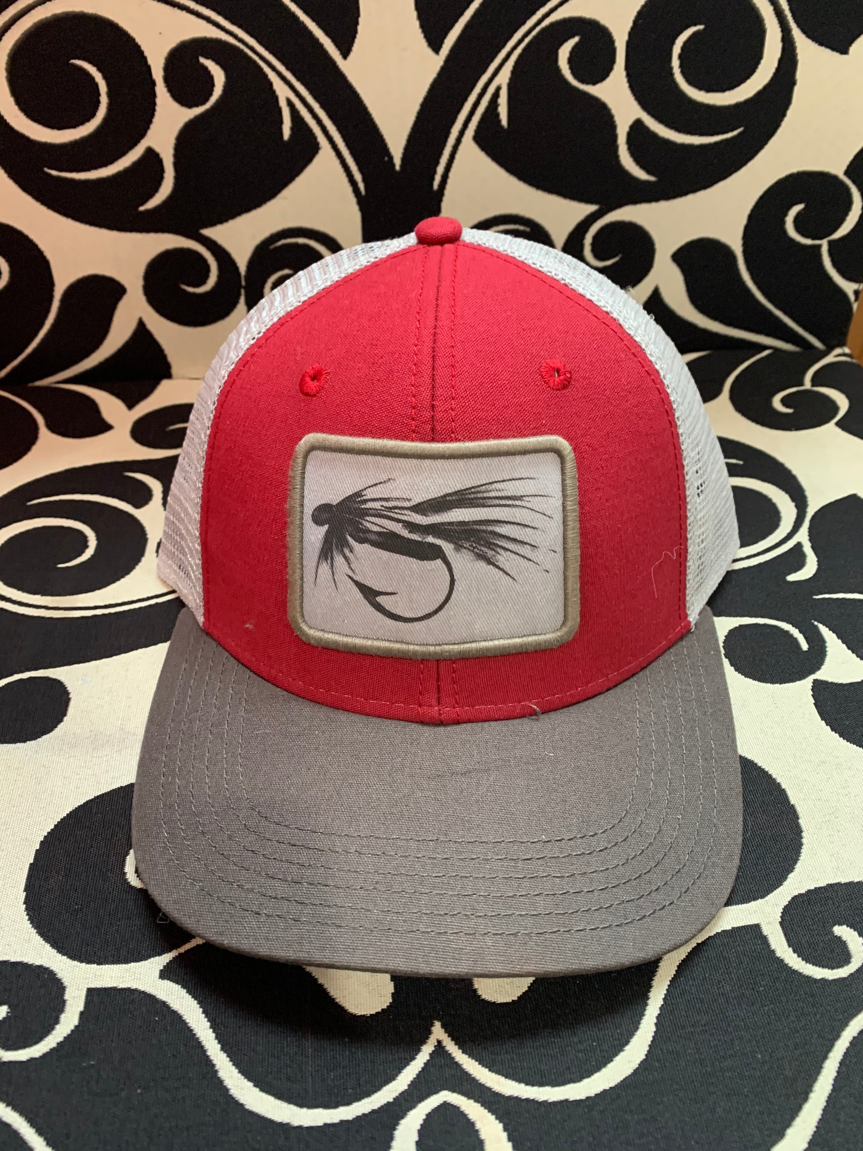 black & white fly red mid pro trucker hat
